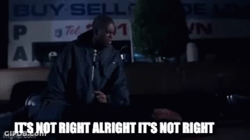 Man Sitting In Front Of Buy Sell Sign GIF