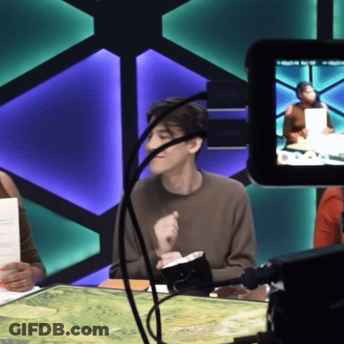 Man Sitting In Front Of Camera With Microphone GIF
