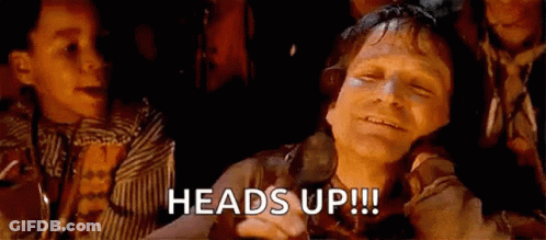 Man Sitting In Front Of Children Saying Heads Up GIF