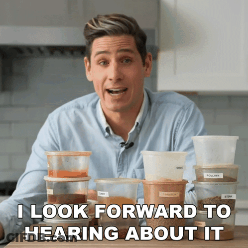 Man Sitting In Front Of Containers I Look Forward To Hearing About It GIF