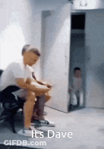 Man Sitting In Front Of Dave Door GIF