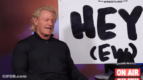 Man Sitting In Front Of Hey Ew Sign GIF