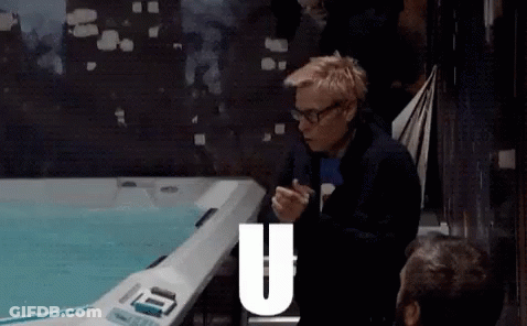 Man Sitting In Front Of Hot Tub With Letter U GIF