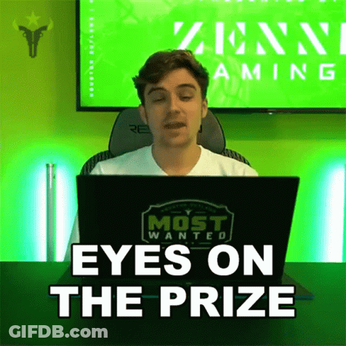Man Sitting In Front Of Laptop Eyes On The Prize GIF