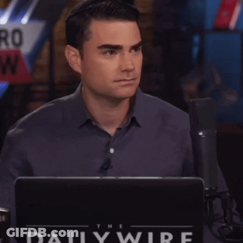 Man Sitting In Front Of Laptop With Daily Wire GIF