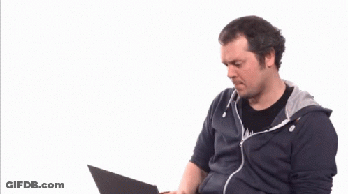 Man Sitting In Front Of Laptop With Three Stars GIF