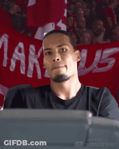 Man Sitting In Front Of Markus Banner GIF