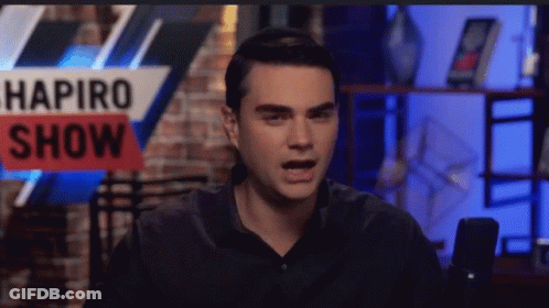 Man Sitting In Front Of Microphone GIF