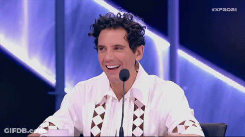 Man Sitting In Front Of Microphone GIF