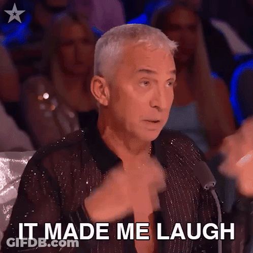 Man Sitting In Front Of Microphone Saying It Made Me Laugh GIF