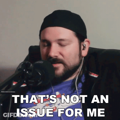 Man Sitting In Front Of Microphone Saying That's Not An Issue GIF