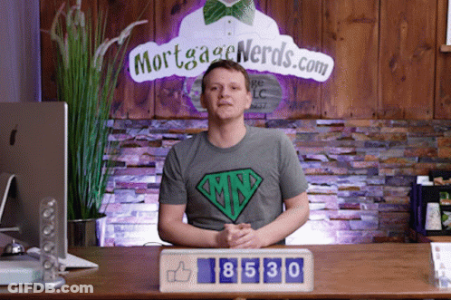 Man Sitting In Front Of Mortgage Nerds Sign GIF