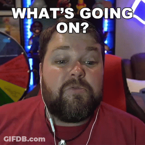 Man Sitting In Front Of Netflix Sign GIF