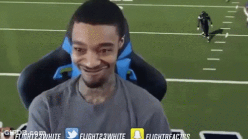 Man Sitting In Front Of Screen Saying Flight23white GIF