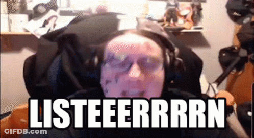 Man Sitting In Front Of Screen Saying Listeerrrn GIF