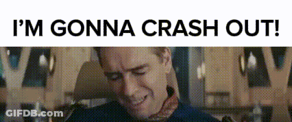Man Sitting In Front Of Sign I'm Gonna Crash Out GIF