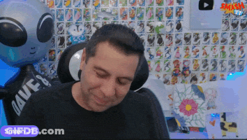 Man Sitting In Front Of Smash JT Balloon GIF