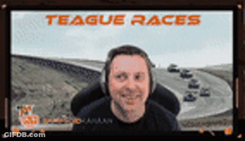 Man Sitting In Front Of Teague Races Screen GIF
