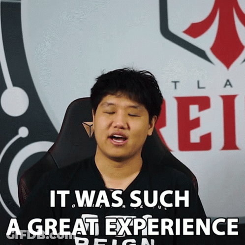 Man Sitting In Front Of Tla Ei Sign GIF