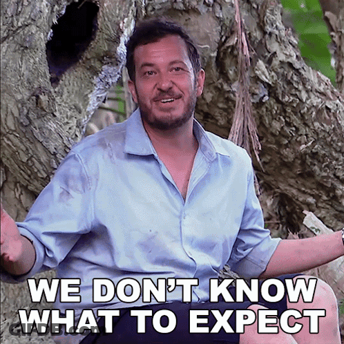 Man Sitting In Front Of Tree Saying We Don't Know What To Expect GIF