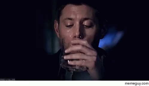 Man Sitting In Front Of UFC Sign GIF