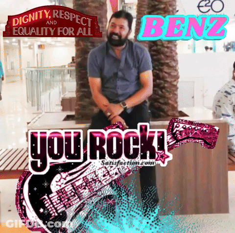 Man Sitting In Front Of You Rock Sign GIF