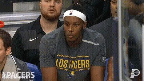 Man Sitting In Los Pacers Shirt At Stadium GIF