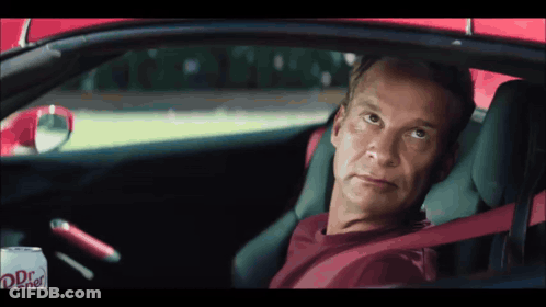 Man Sitting In Red Car With Dr Pepper Can GIF