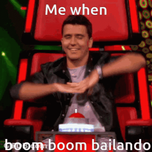 Man Sitting In Red Chair Boom Boom Bailando GIF