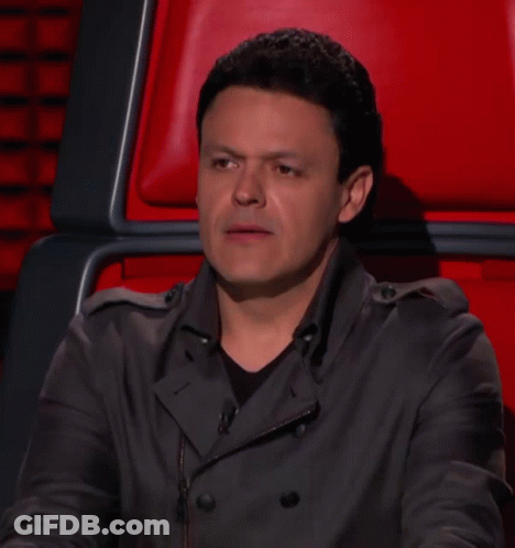 Man Sitting In Red Chair Laughing GIF