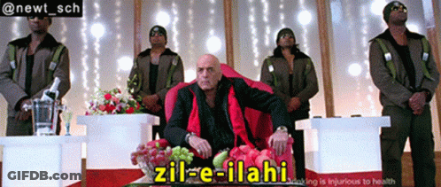 Man Sitting In Red Chair Zil-E-Ilahi GIF