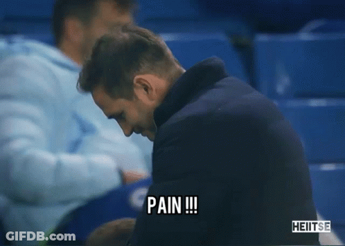 Man Sitting In Stadium Saying Pain GIF