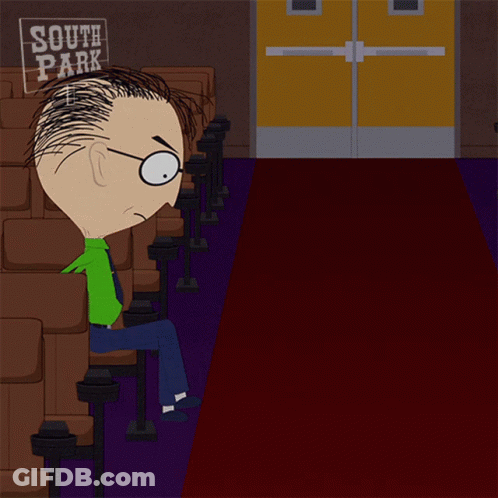 Man Sitting In Theater With South Park Sign GIF