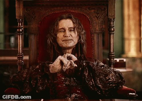 Man Sitting In Throne With Hands Folded GIF
