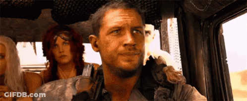Man Sitting In Truck With Two Women GIF