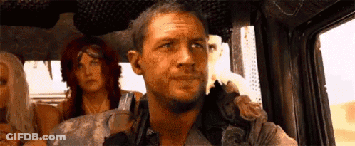 Man Sitting In Truck With Two Women GIF