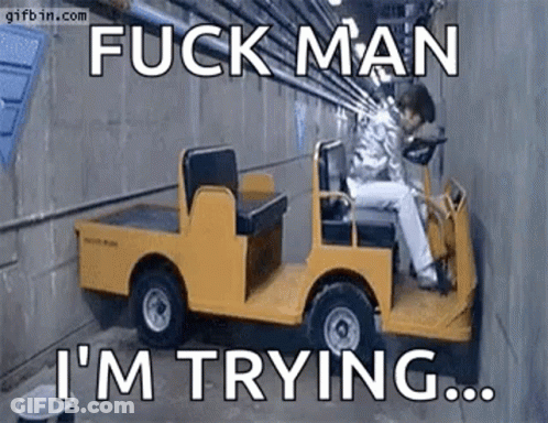 Man Sitting In Yellow Golf Cart GIF