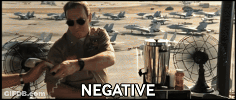 Man Sitting Near Planes Negative GIF