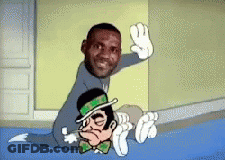 Man Sitting Next To Cartoon Character With Green Hat GIF