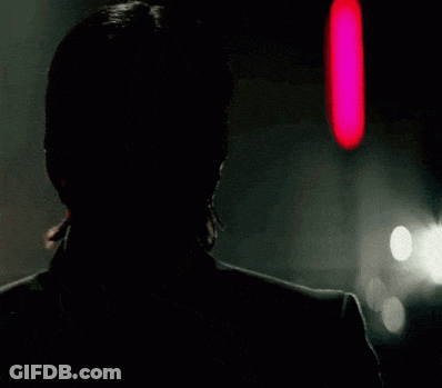 Man Sitting Next To Woman In Red Dress GIF