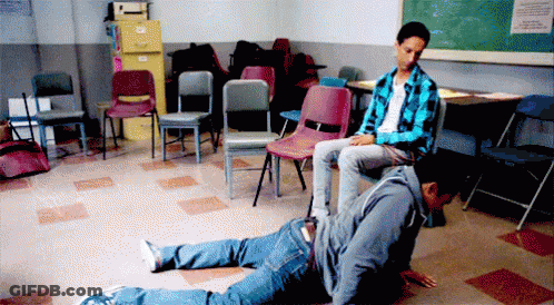 Man Sitting On Another Man's Back GIF