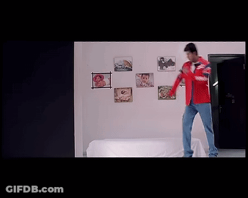 Man Sitting On Bed Holding Baby With Nurse GIF