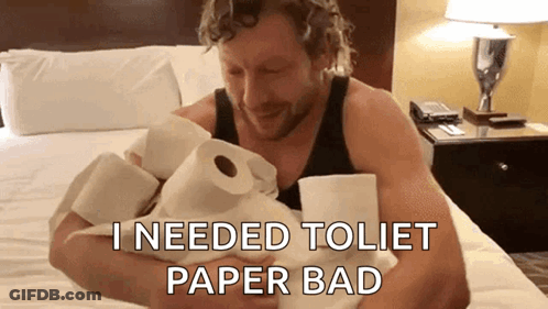 Man Sitting On Bed Holding Toilet Paper Saying I Needed Toilet Paper Bad GIF