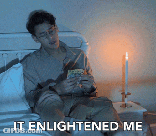 Man Sitting On Bed With Candle Saying It Enlightened Me GIF