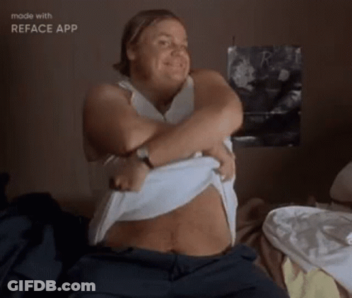 Man Sitting On Bed With Crossed Arms GIF