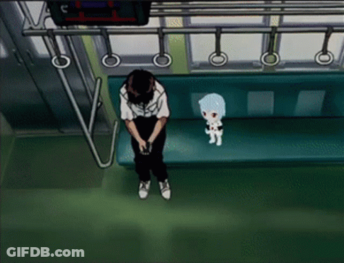 Man Sitting On Bench Next To Stuffed Animal GIF