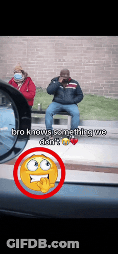 Man Sitting On Bench Talking On Cell Phone Woman In Mask Behind GIF