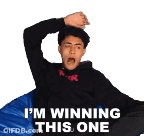 Man Sitting On Blue Bean Bag Saying Im Winning GIF