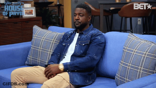 Man Sitting On Blue Couch In House Of Payne Scene GIF