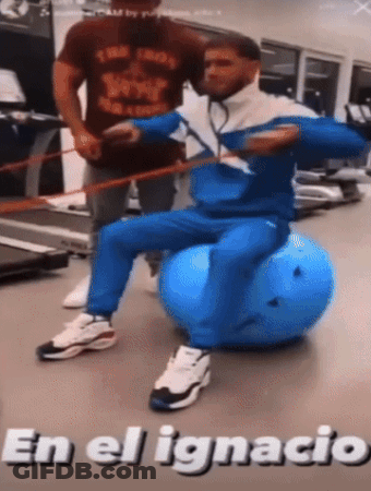 Man Sitting On Blue Exercise Ball En El Ignacio GIF